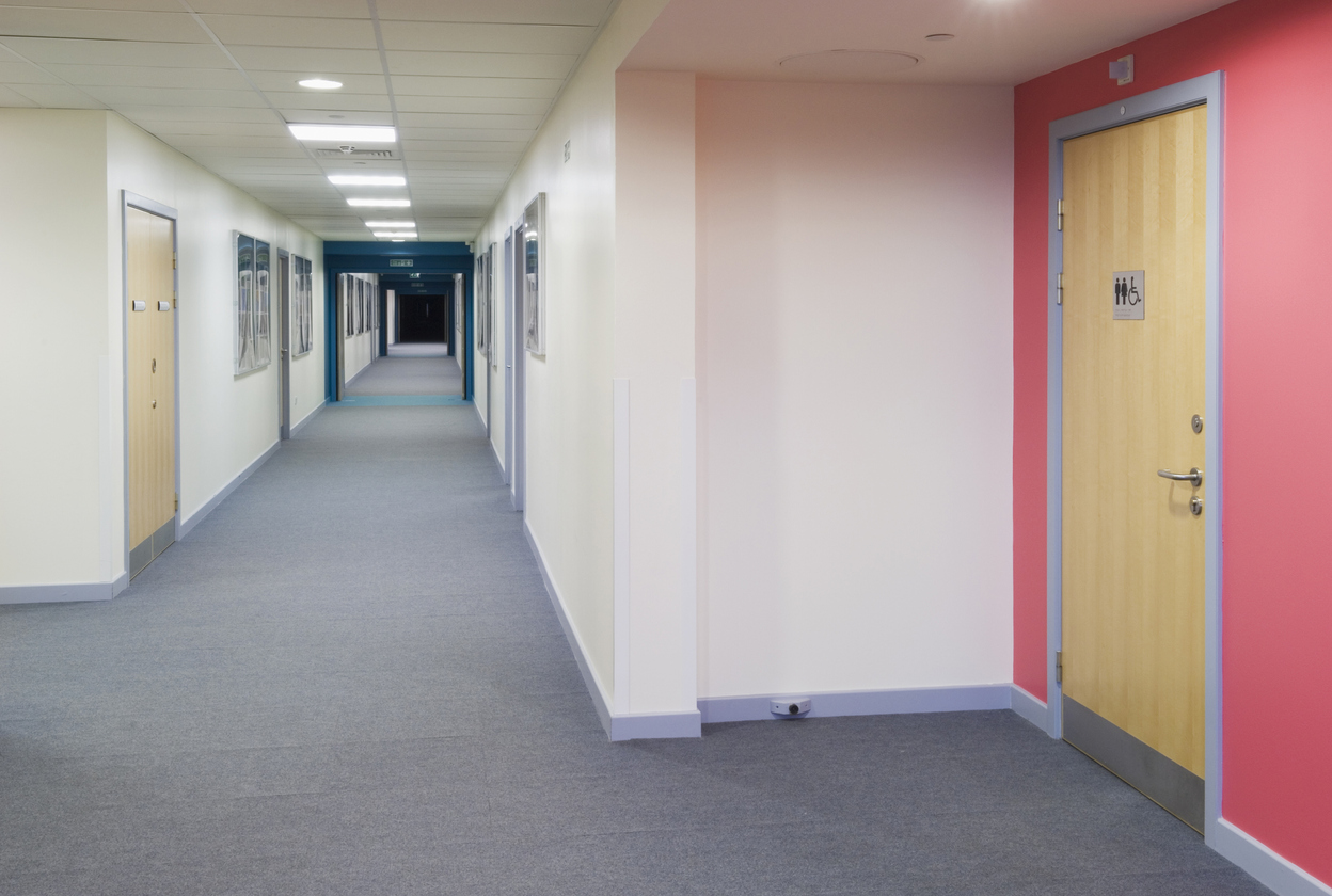 Looking along a corridor in a modern secondary school.